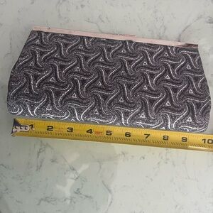 Sparkly 9.5” Metallic Black &Silver Ladies Clutch adds elegance to any occasion.